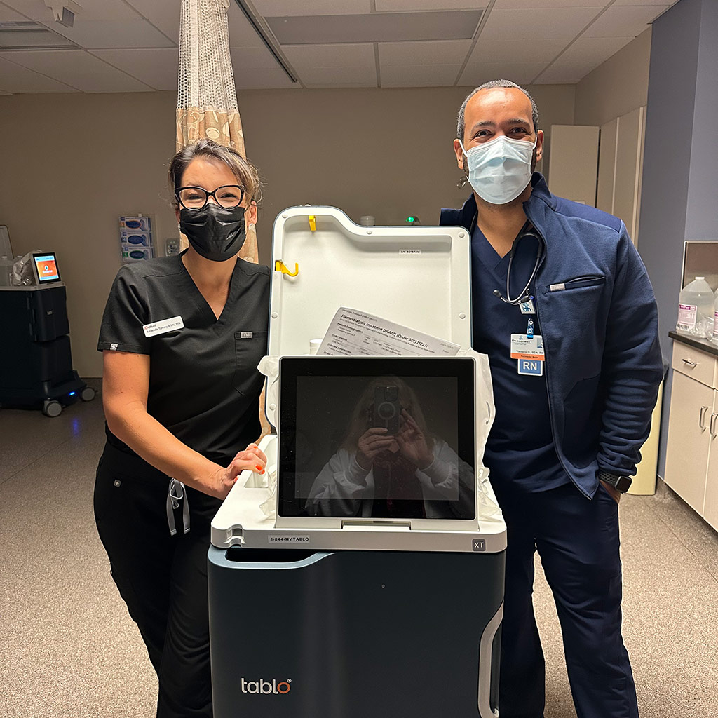 Amanda Torney and Dario De Pina with a Tablo machine