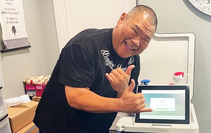 Smiling patient with Tablo dialysis machine