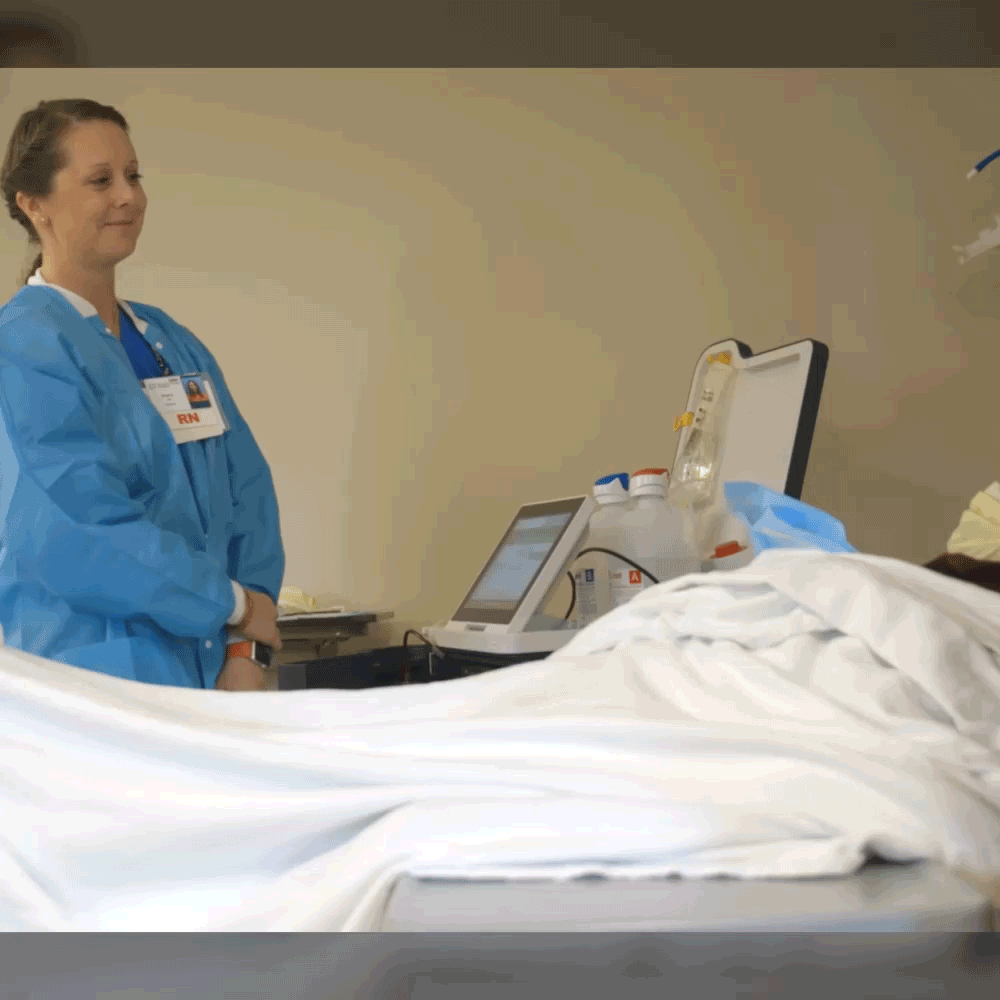 Nurse talking to dialysis patient
