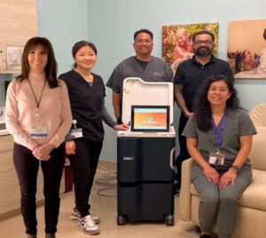 Left to right: Sheri Kujundzich RN, BSN, CNN, Jackie-Jae Kim RN, BSN, CDN, Anthony Manglicmot RN, BSN, Javier Flores, CCHT, and Eileen Aguilar RN, BSN, CNN with a Tablo console at Satellite Healthcare in Orange, CA