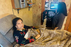 Two women with a Tablo Hemodialysis System, at home